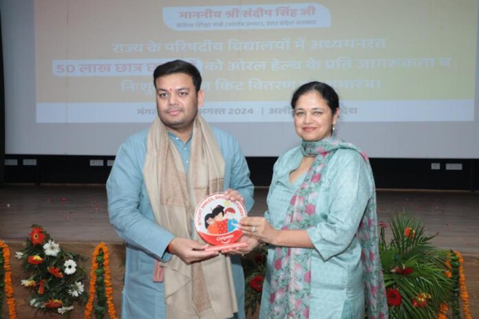 Aligarh, Uttar Pradesh: In its ongoing efforts to enhance Oral Health Education, Colgate has signed a Memorandum of Understanding (MoU) with the Government of Uttar Pradesh to bring its flagship program, Colgate Bright Smiles, Bright Futures® (BSBF) to the children across the state. Through this collaboration, Colgate aims to intensify the outreach of its BSBF in-school program in Uttar Pradesh by committing to reach 50 lakh students in 2 years. This vital initiative was inaugurated, with the first phase of impacting 50 lakh children by 2026, in the esteemed presence of Shri Sandeep Singh, Honourable Minister of State (Independent Charge) for Basic Education, GoUP, Dr. M.K. Shanmuga Sundaram, Principal Secretary, Department of Basic Education, GoUP and Smt Prabha Narasimhan, MD & CEO of Colgate-Palmolive (India) Limited. Colgate’s Bright Smiles, Bright Futures®, that translates into ‘Ujwal Muskaan, Ujwal Bhavishya’ in Hindi is a carefully designed initiative focused on right Oral Care habits, raising awareness about tobacco prevention, and promoting good nutrition for Oral Health among school children aged 6 to 15 years. The program focuses on five critical missions: the right way of brushing, importance of brushing twice daily, replacing one’s toothbrush every three months, abstaining from the use of tobacco, and embracing nutritious food choices. Supplementary materials including dental kits, brushing calendars, teacher training guides, and certificates will arm children and educationists with essential lifelong knowledge. Addressing the audience at the launch ceremony Shri Sandeep Singh, Honourable Minister of State (Independent Charge), Basic Education, Government of UP said, “I am delighted to be joined by Ms. Prabha Narasimhan, the Colgate team, teachers and students today for this event focused on the important cause of Oral Healthcare. We believe that this is fundamental to overall well-being, and by partnering with Colgate, we aim to bring Oral Care Education to students and inculcate the importance of Oral Hygiene via the curriculum and the libraries in all our schools across the state.” Addressing the partnership, Smt Prabha Narasimhan, MD & CEO of Colgate-Palmolive (India) Limited, added, “Our vision to enhance Oral Care awareness and education in India is unwavering, supported by our advancements in scientific research. We are deeply honored to partner with the Government of Uttar Pradesh and are committed to engaging with all 1.93 crore children in the state. With this, we will further propel our mission to create meaningful, positive change for children in the region. Our Colgate Bright Smiles, Bright Futures® will continue to champion healthy smiles”. Since its inception in 1976, the Colgate Bright Smiles, Bright Futures® program has positively impacted over 176 million children across India with the knowledge of good Oral Health Habits. The inauguration ceremony hosted in Aligarh officially marked the commencement of this program, and it also witnessed the esteemed presence of Ms. Shilpashree Muniswamappa, Director – ESG & Communications at Colgate-Palmolive (India) Limited, Shri. Ruchir Bhatnagar, Senior Director- Customer Development at Colgate-Palmolive (India) Limited, Shri Bhomik Shah, Trustee, BharatCares, Shri. Vikas G IAS, District Magistrate, Aligarh, GoUP, Shri. Sanjiv Suman IPS, Senior Superintendent of Police, Aligarh, GoUP, Shri. Anil Parashar, MLA, Shri. Ravendra Pal Singh, MLA, Shri. Raj Kumar Sahyogi, MLA, Shri. Manvendra Pratap Singh, MLC, Shri. Krishnapal Singh, BJP President, Aligarh, Smt. Vijay Singh, Zila Panchayat Adhyaksh, Shri. Prashant Singhal, Mayor, Aligarh and Shri. Rakesh Singh, Basic Shiksha Adhikari, Aligarh, GoUP.